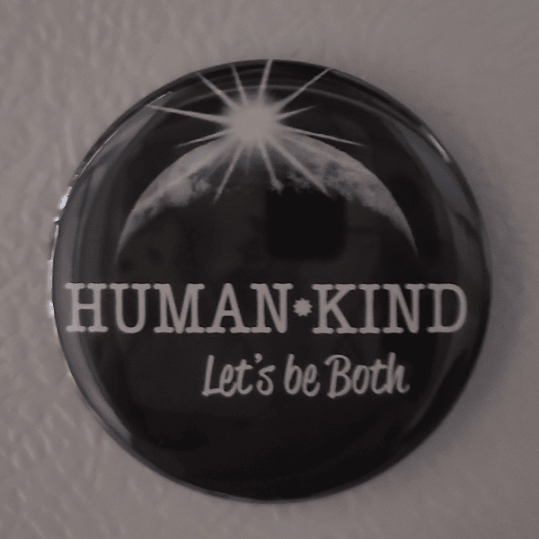 Human Kind magnet on fridge