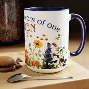 We are all flowers of one Garden 15 oz coffee mug with Blue handle and interior